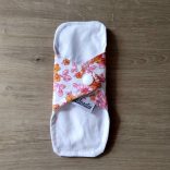 Narancs virág tisztasági mosható betét 16cm (piskóta forma)